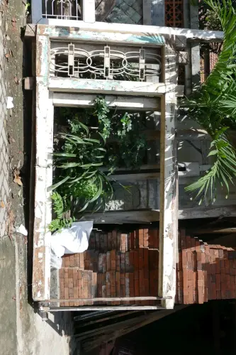 Product image of the product “Antique door made from teak wood with top square carving, 145cm length, 16cm width, and 275cm height ”